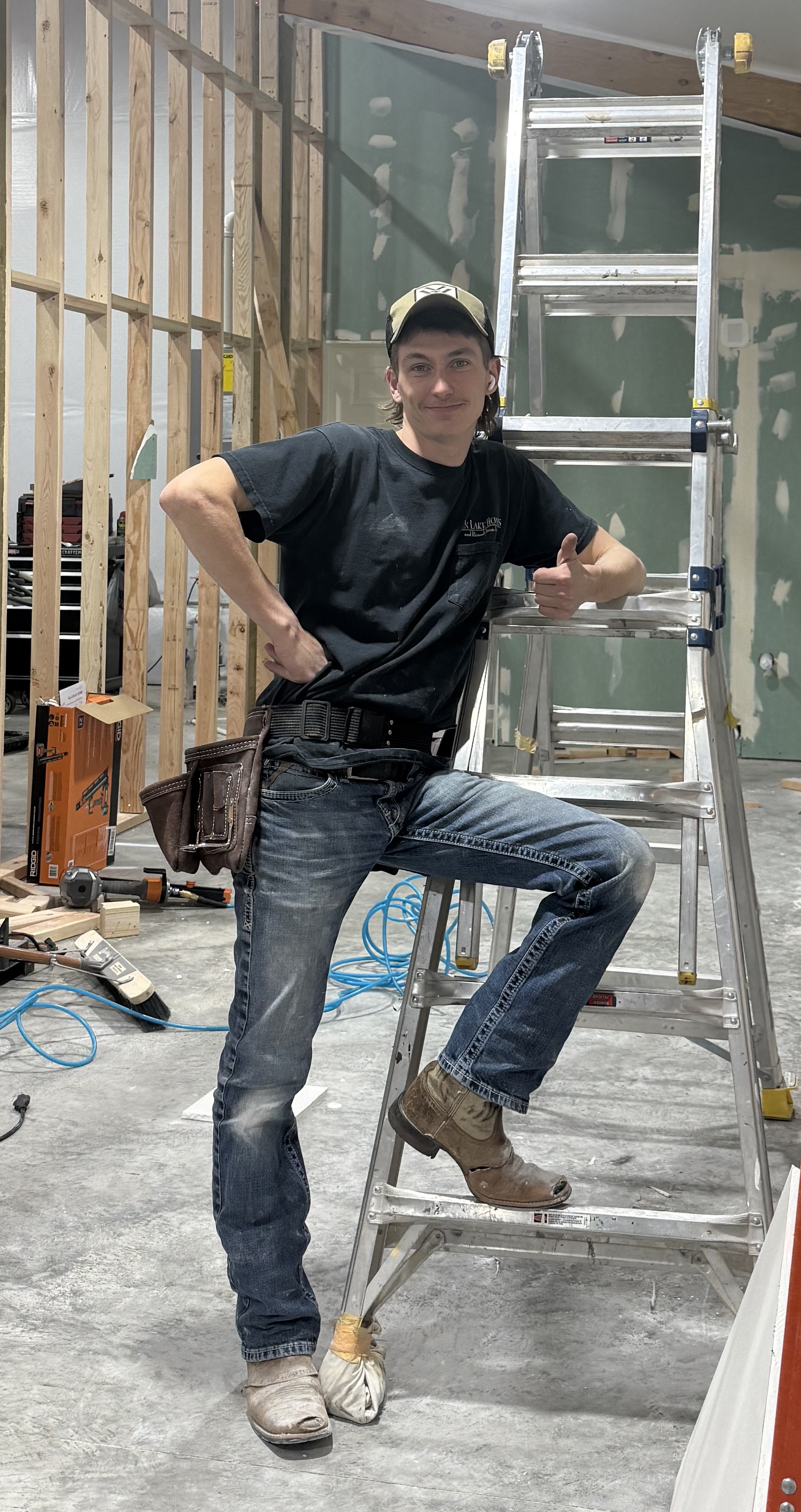 George Lake on a ladder